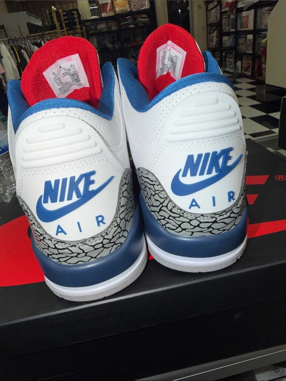 Jordan men’s  White/Red/Blue Retro Sneakers